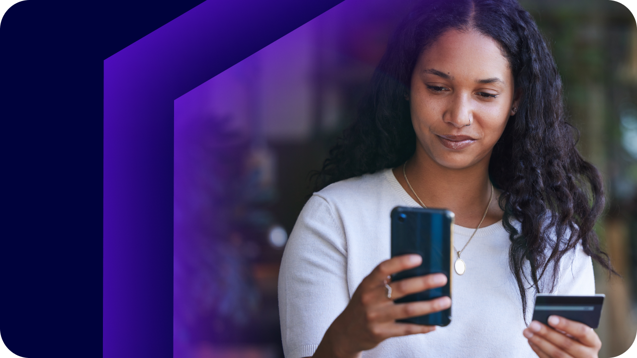 Image of woman looking at mobile banking app