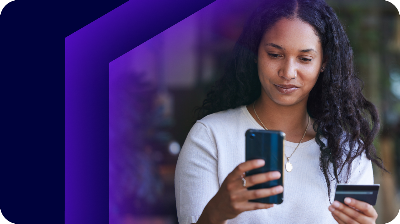 Image of woman looking at mobile banking app